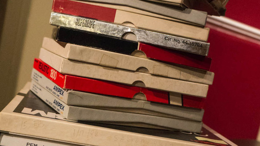A stack of amateur recordings of Sacred Harp singings on open reel tapes.